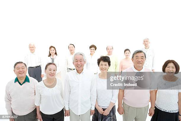 mature and senior people smiling, high angle view - 人の列 ストックフォトと画像