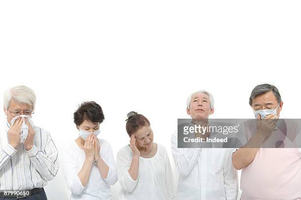 senior men and women coughing feeling pain - old cough stock pictures, royalty-free photos & images