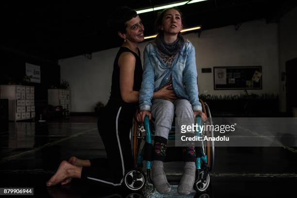 Dancers gesture as they practice during a performance training at the ConCuerpos Gym in Bogota, Colombia on November 25, 2017. ConCuerpos Dance...