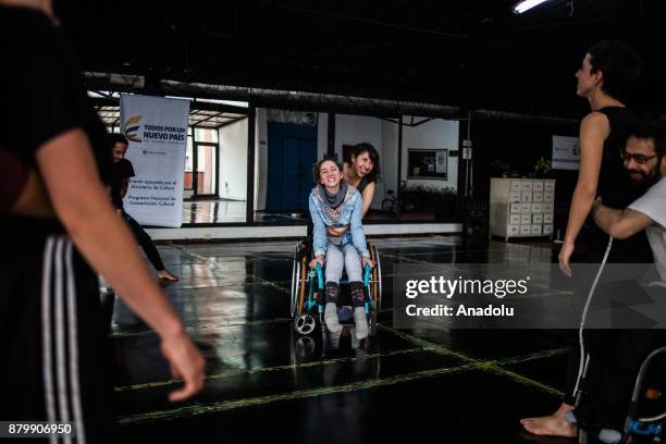 Dancers gesture as they practice during a performance training at the ConCuerpos Gym in Bogota, Colombia on November 25, 2017. ConCuerpos Dance...