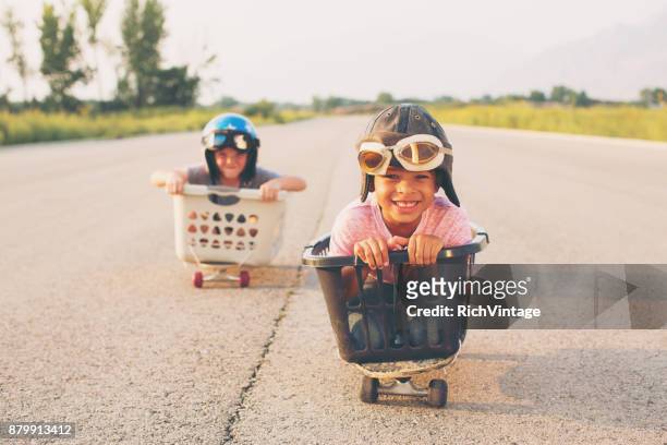 young boy basket racers - intellectual ventures stock pictures, royalty-free photos & images