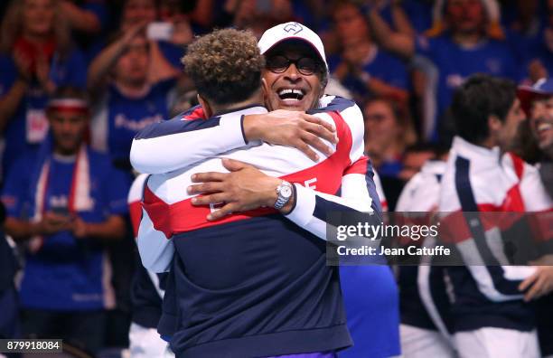 Captain of France Yannick Noah and Jo-Wilfried Tsonga celebrate winning the Davis Cup during day 3 of the Davis Cup World Group final between France...