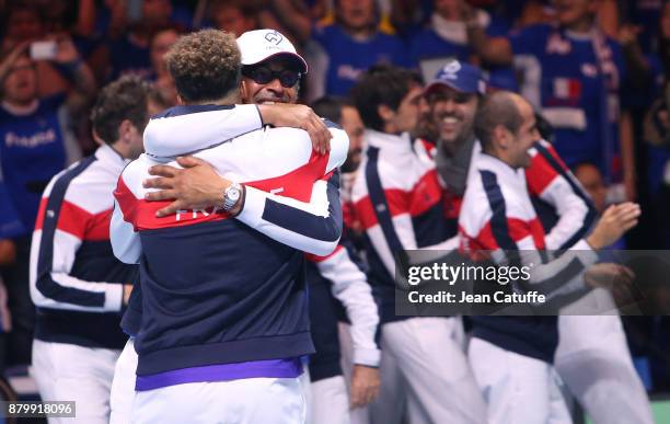 Captain of France Yannick Noah and Jo-Wilfried Tsonga celebrate winning the Davis Cup during day 3 of the Davis Cup World Group final between France...