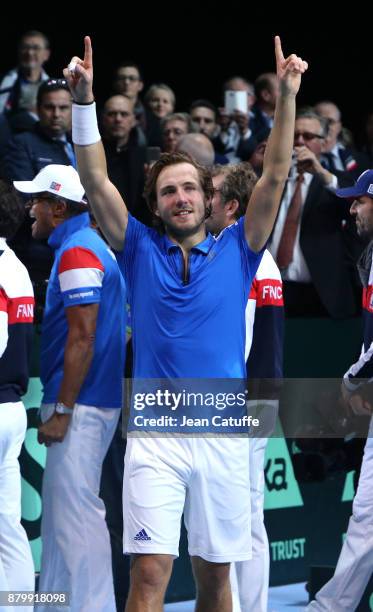 Lucas Pouille of France celebrates winning the 5th match and the Davis Cup 2017 during day 3 of the Davis Cup World Group final between France and...