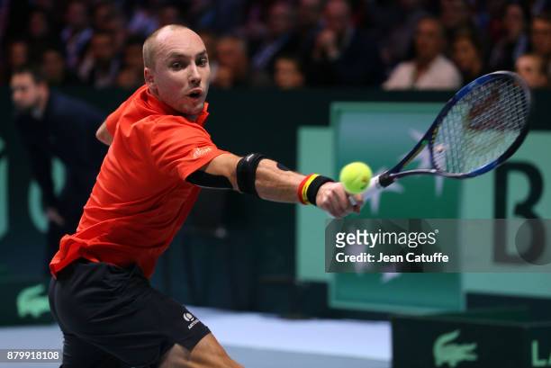 Steve Darcis of Belgium in action against Lucas Pouille of France during day 3 of the Davis Cup World Group final between France and Belgium at Stade...