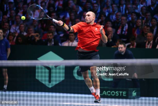 Steve Darcis of Belgium in action against Lucas Pouille of France during day 3 of the Davis Cup World Group final between France and Belgium at Stade...