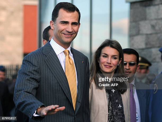 Spain's Crown Prince Felipe de Borbon and his wife princess Letizia Ortiz smile upon arrival at the CATAM military base in Bogota, Colombia, on May...