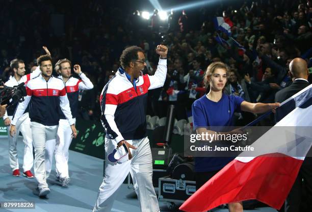 Captain of France Yannick Noah celebrates winning the Davis Cup during day 3 of the Davis Cup World Group final between France and Belgium at Stade...