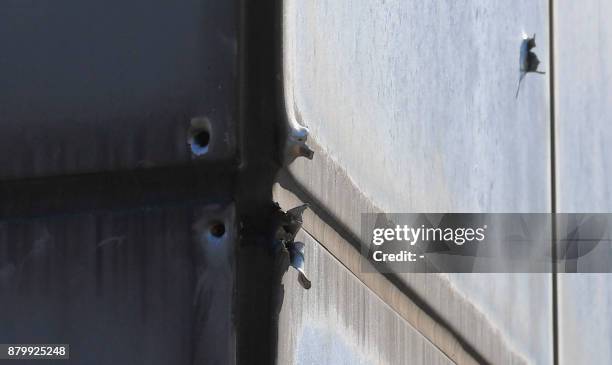 Bullet marks are seen on a South Korean building at the truce village of Panmunjom in the Demilitarized zone dividing the two Koreas on November 27,...