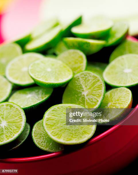sliced limes - key lime stock pictures, royalty-free photos & images