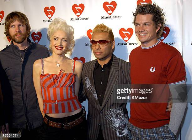 Tom Dumont, Gwen Stefani, Tony Kanan and Adrian Young of No Doubt attend 45th GRAMMY Awards - MusiCares 2003 Person of the Year
