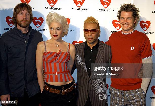 Tom Dumont, Gwen Stefani, Tony Kanan and Adrian Young of No Doubt attend 45th GRAMMY Awards - MusiCares 2003 Person of the Year