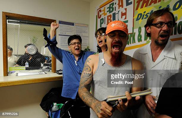 Jeanne Cordova, Lynn Ballen, Tony Espinoza and Jocob Hale chant in the East Los Angeles Marriage License Office May 26, 2009 in Los Angeles,...