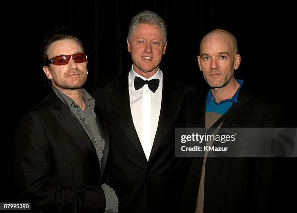 Bono of U2, President Bill Clinton, and Michael Stipe