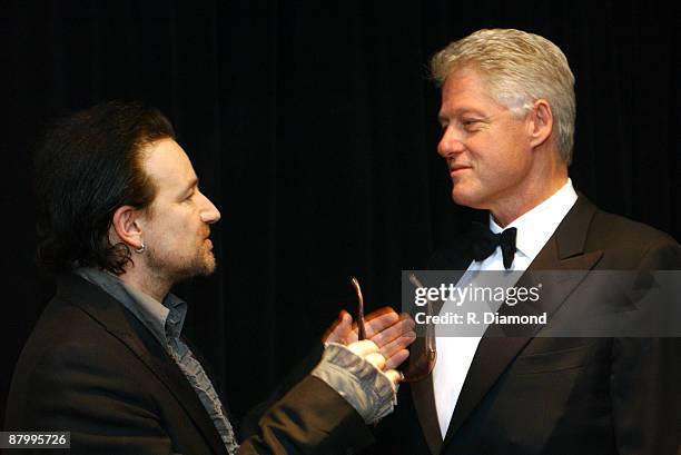 Bono and former President Bill Clinton