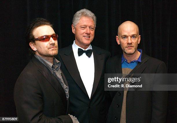 Bono, former President Bill Clinton and Michael Stipe
