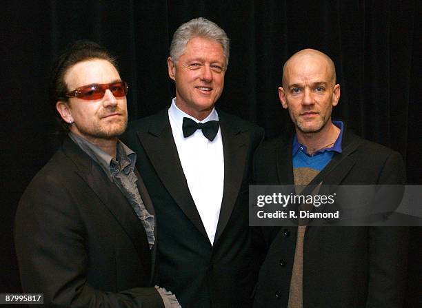 Bono, former President Bill Clinton and Michael Stipe