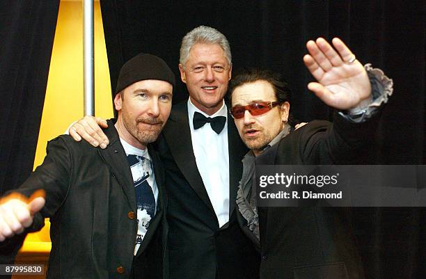 The Edge, former President Bill Clinton and Bono