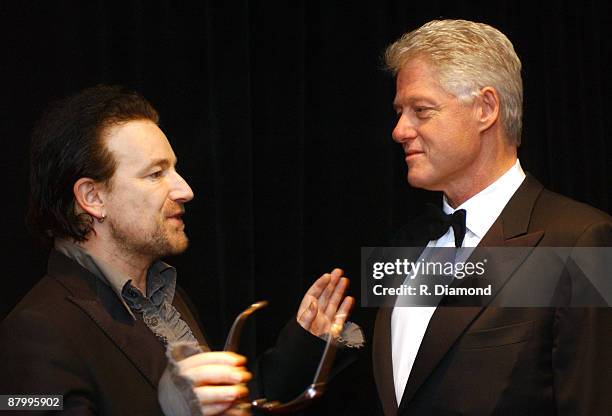 Bono and former President Bill Clinton