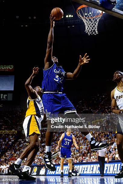 Horace Grant of the Orlando Magic shoots a layup against the Indiana Pacers in Game Four of the Eastern Conference Finals during the 1995 NBA...