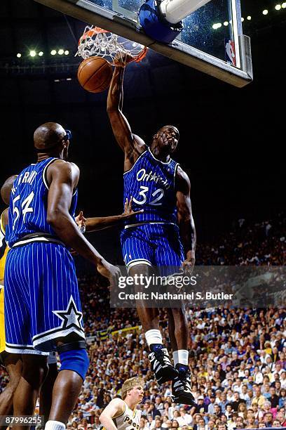 Shaquille O'Neal of the Orlando Magic dunks against the Indiana Pacers in Game Four of the Eastern Conference Finals during the 1995 NBA Playoffs on...