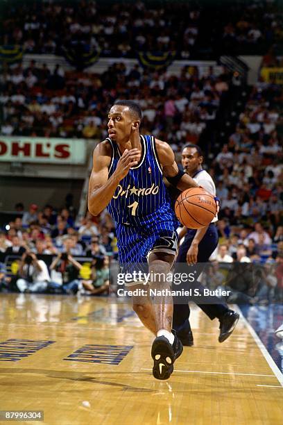 Anfernee Hardaway of the Orlando Magic moves the ball up court against the Indiana Pacers in Game Three of the Eastern Conference Finals during the...