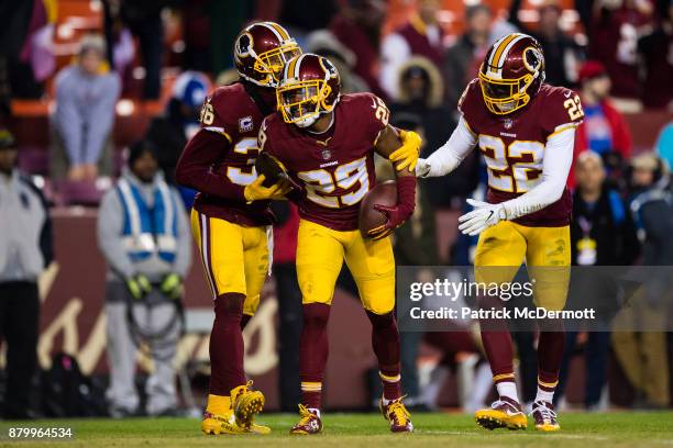 Cornerback Kendall Fuller of the Washington Redskins celebrates wtih free safety D.J. Swearinger and strong safety Deshazor Everett after...