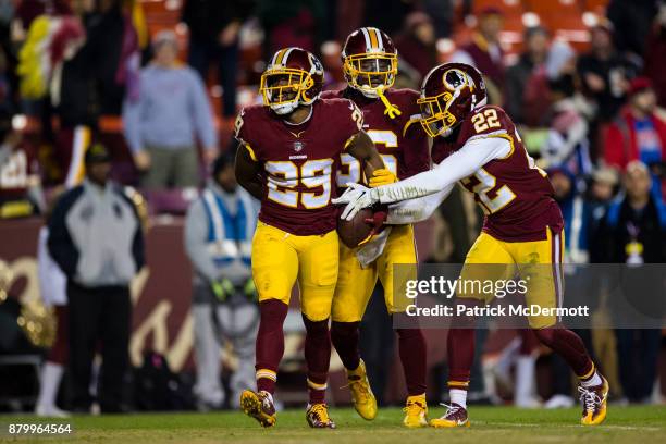 Cornerback Kendall Fuller of the Washington Redskins celebrates wtih free safety D.J. Swearinger and strong safety Deshazor Everett after...