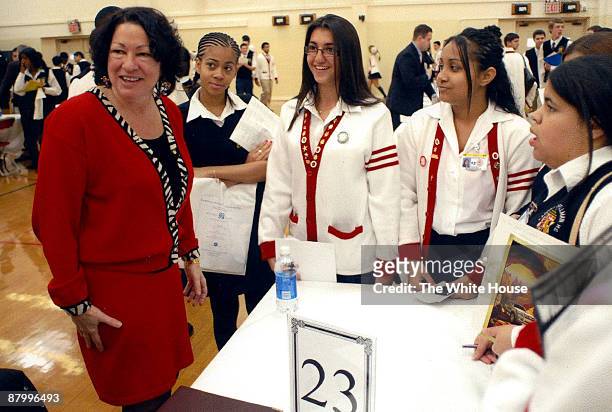 In this handout image provided by The White House on May 26 Judge Sonia Sotomayor visits students at her alma mater, Cardinal Spellman High School,...