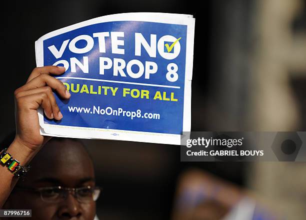 Students attend a protest rally in Westwood, California on May 26 following the California Supreme Court decision to uphold Proposition 8, which...