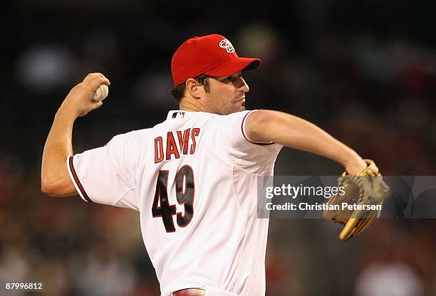 Starting pitcher Doug Davis of the Arizona Diamondbacks pitches against the San Diego Padres during the major league baseball game at Chase Field on...