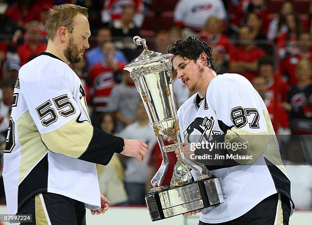 Sidney Crosby and Sergei Gonchar of the Pittsburgh Penguins hold the Prince of Wales trophy after their 4-1 win over the Carolina Hurricanes in Game...