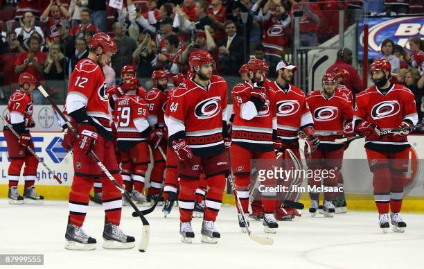 The Carolina Hurricanes look on after losing Game Four of the Eastern Conference Championship Round of the 2009 Stanley Cup Playoffs to the...