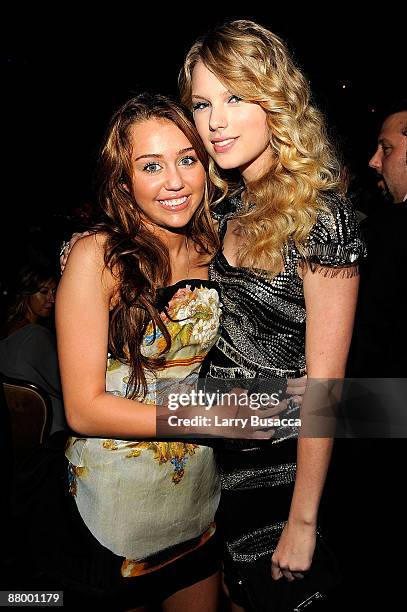 Singers Miley Cyrus and Taylor Swift attend the 2009 GRAMMY Salute To Industry Icons honoring Clive Davis at the Beverly Hilton Hotel on February 7,...