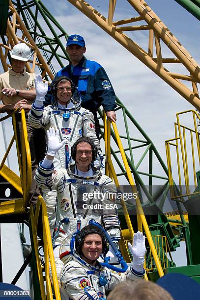 In this handout photo provided by the European Space Agency , The Soyuz TMA-15 crew of Canadian Space Agency astronaut Robert Thirsk , Russian...