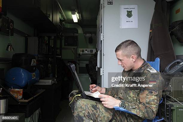 Soldier works at the access net at the military training area on May 26, 2009 in Luebtheen near Schwerin, Germany. German armed forces built a camp...