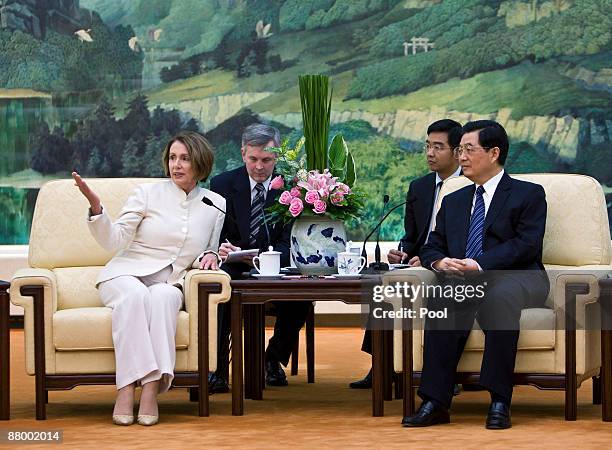 Nancy Pelosi, speaker of the United States House of Representatives, meets with Chinese President Hu Jintao during a meeting at the Great Hall of the...