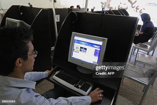 An Iranian youth browses a political blog at an internet cafe in the city of Hamadan, 360 kms southwest of Tehran, on May 27, 2009. Reformists in...