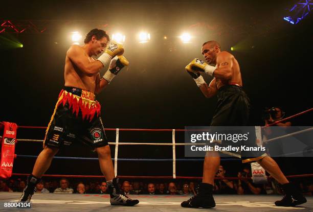 Anthony Mundine and Daniel Geale in action during the IBO middleweight world title fight between Anthony Mundine and Daniel Geale at the Brisbane...