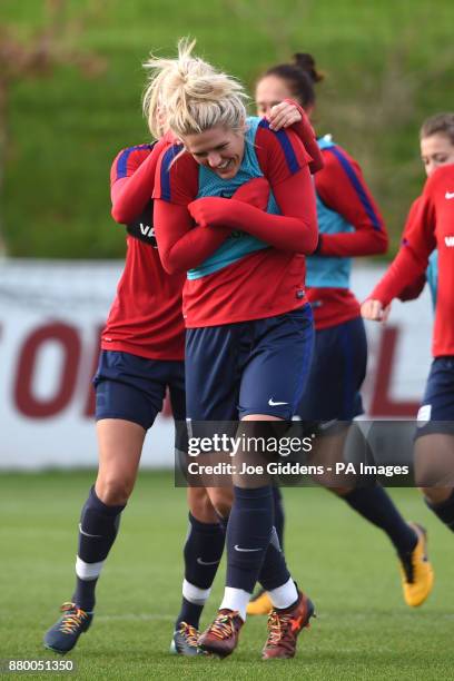 England's Millie Bright and Steph Houghton during the training session at St George's Park, Burton.