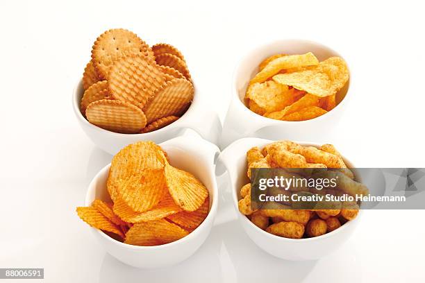 assorted snacks in bowls, elevated view - cracker snack 個照片及圖片檔