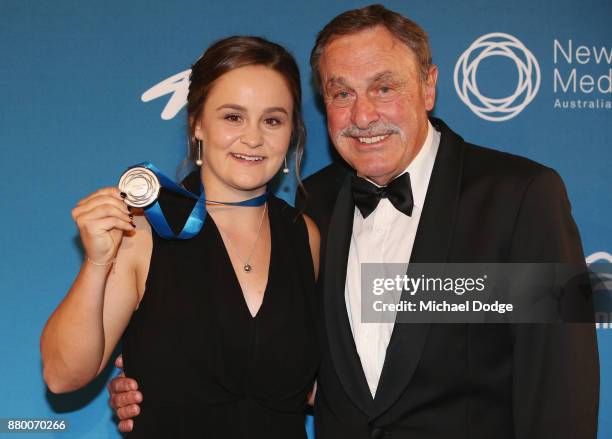 John Newcombe medallist Ashleigh Barty poses with John Newcombe at the 2017 Newcombe Medal at Crown Palladium on November 27, 2017 in Melbourne,...