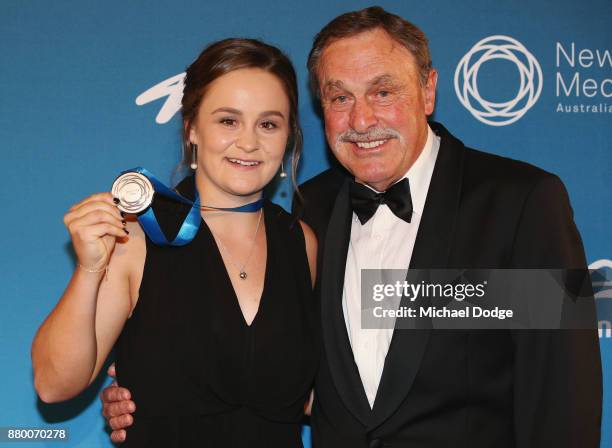 John Newcombe medallist Ashleigh Barty poses with John Newcombe at the 2017 Newcombe Medal at Crown Palladium on November 27, 2017 in Melbourne,...