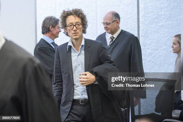 Lars Schlecker and Meike Schlecker , children of the founder of the now bankrupt German drugstore chain Schlecker, arrives for the last day of his...