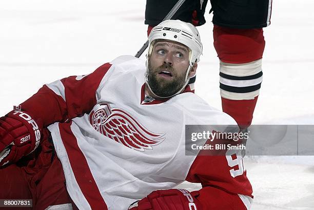 Tomas Holmstrom of the Detroit Red Wings looks up from falling on the ice during Game Three of the Western Conference Finals of the 2009 Stanley Cup...