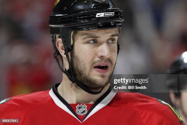 Brent Seabrook of the Chicago Blackhawks watches the action from the bench during Game Three of the Western Conference Finals of the 2009 Stanley Cup...