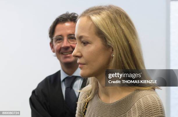 Meike Schlecker, daughter of Anton Schlecker, founder of drugstore chain Schlecker, arrives at the district court in Stuttgart, southwestern Germany,...