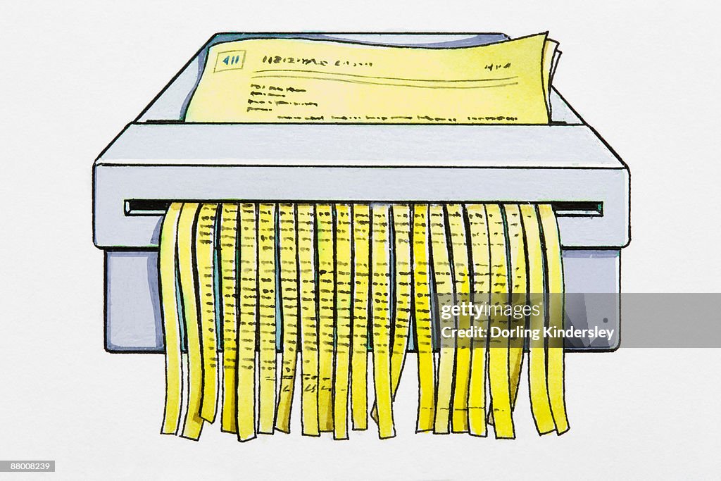 Paper being put through shredder