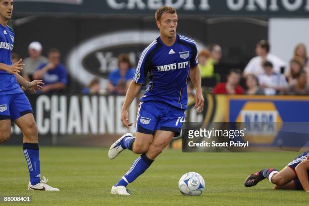 Jack Jewsbury of the Kansas City Wizards dribbles the ball against Chivas USA during the game at Community America Ballpark on May 23, 2009 in Kansas...