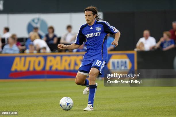 Santiago Hirsig of the Kansas City Wizards passes the ball against Chivas USA during the game at Community America Ballpark on May 23, 2009 in Kansas...